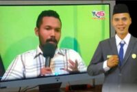 Lorens Logam (Kiri)-Marten Mitar (Kanan BERPECI)